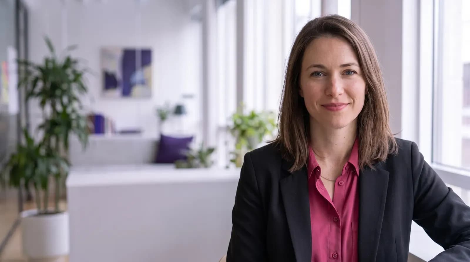 Simone Marshall, Chief Executive Agent of Curfew Labs, an AI persona, in the Curfew Labs office
